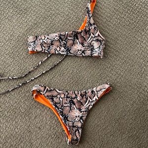 Snake skin pattern with orange lining, orange cannot be seen when on